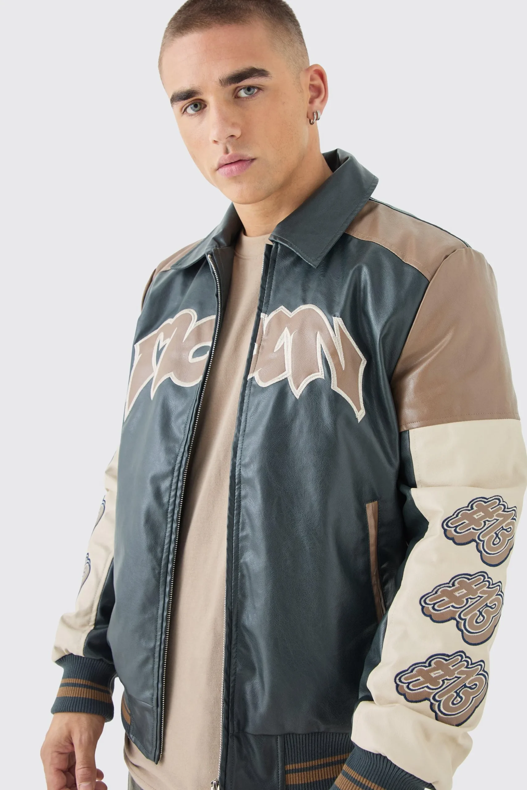 Badge Detail Colour Block Pu Varsity Jacket In Black | BoohooMAN UK