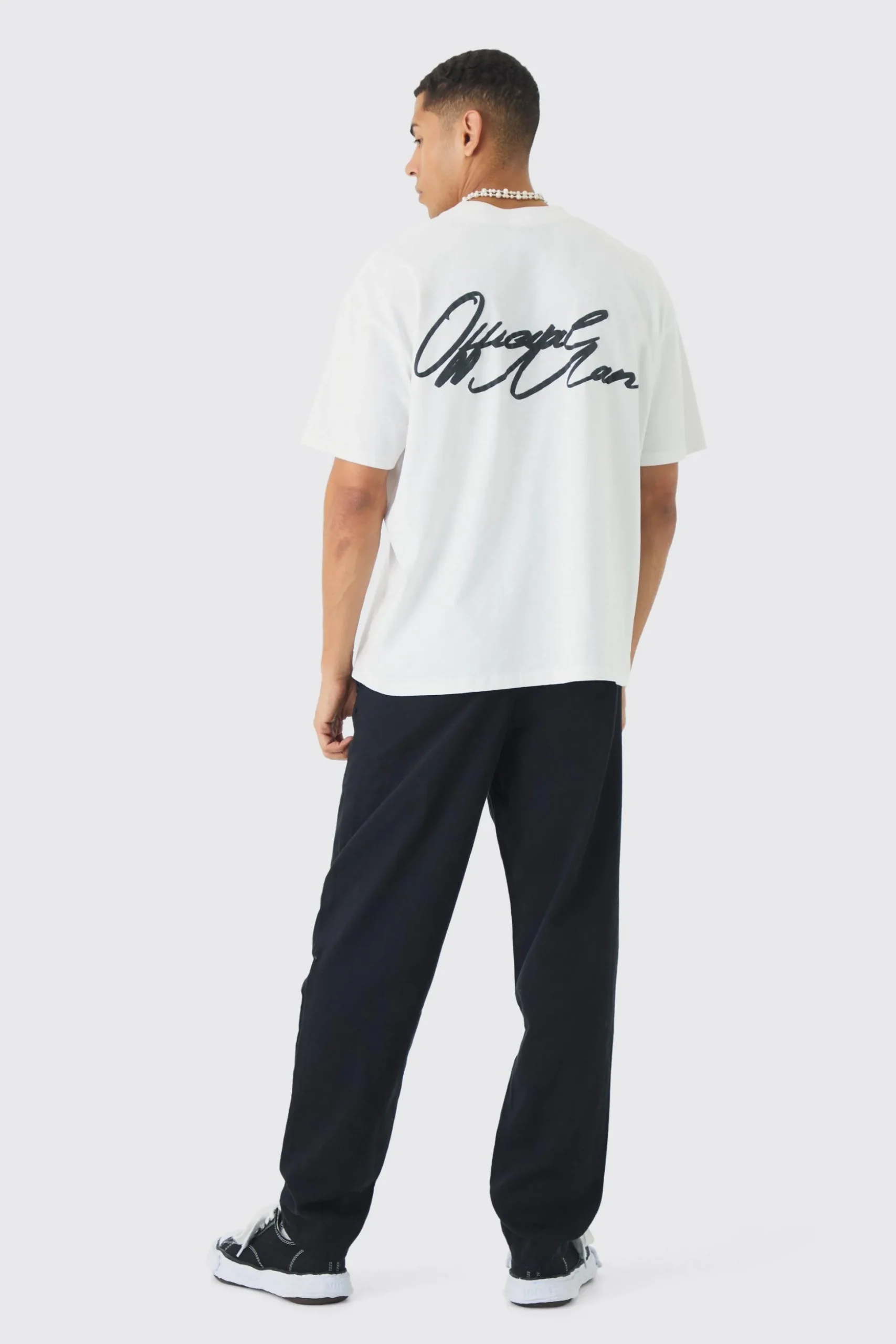 Baggy Tapered Chinos In Black | BoohooMAN UK