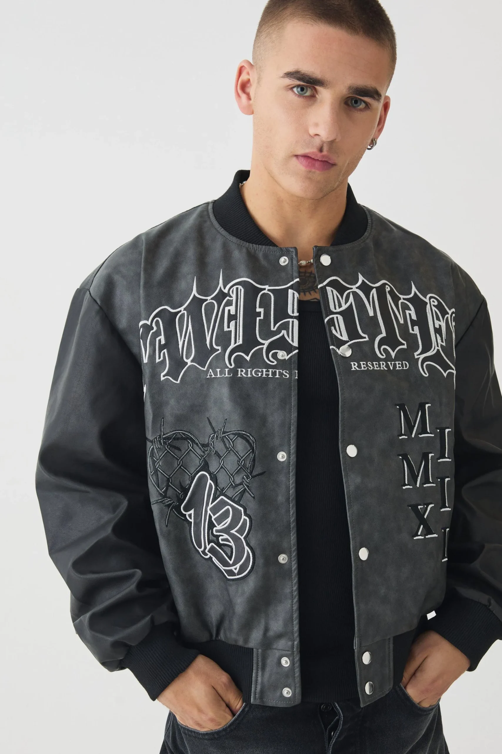 Boxy Tonal Badge Tumbled Pu Varsity Jacket In Black | BoohooMAN UK