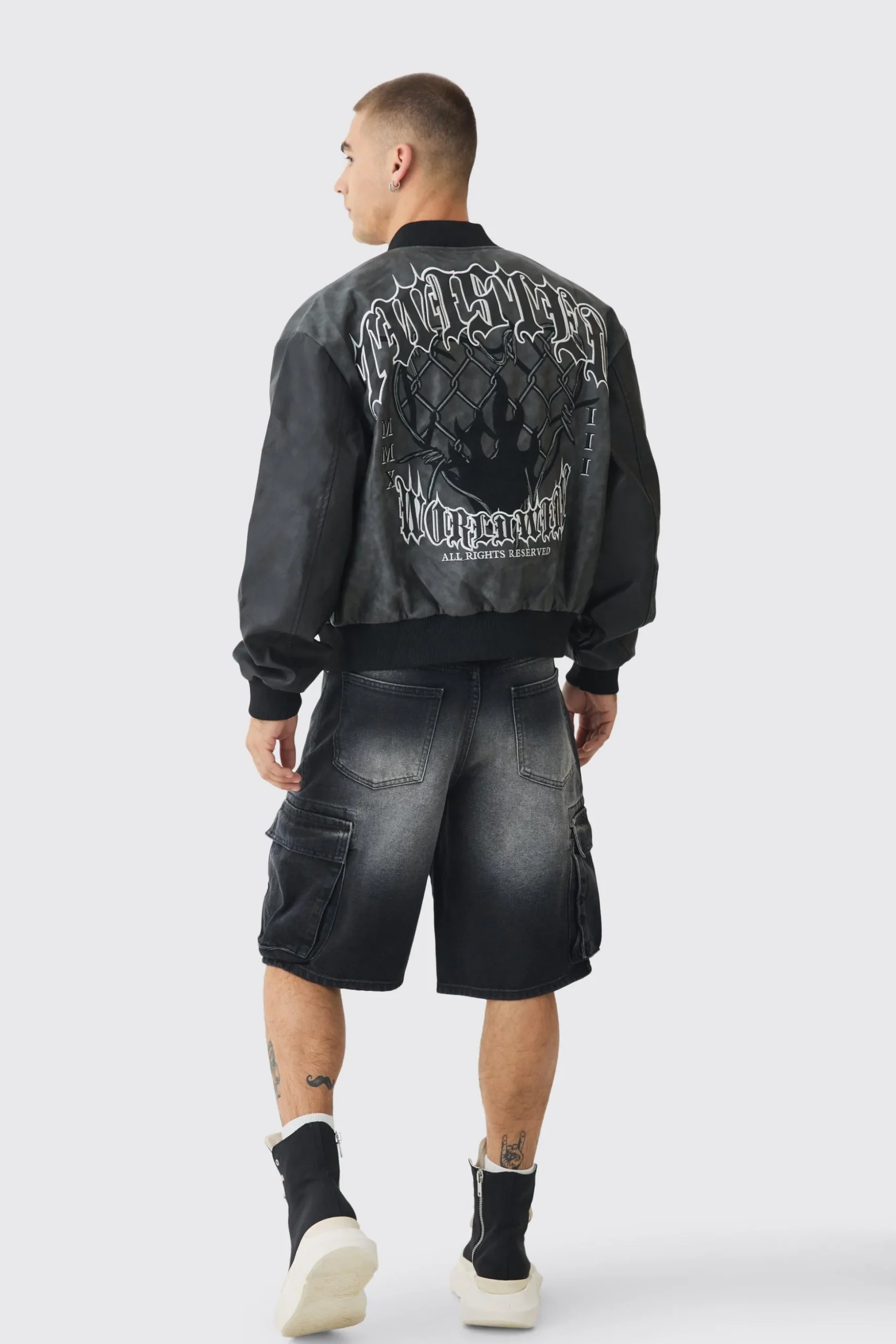 Boxy Tonal Badge Tumbled Pu Varsity Jacket In Black | BoohooMAN UK