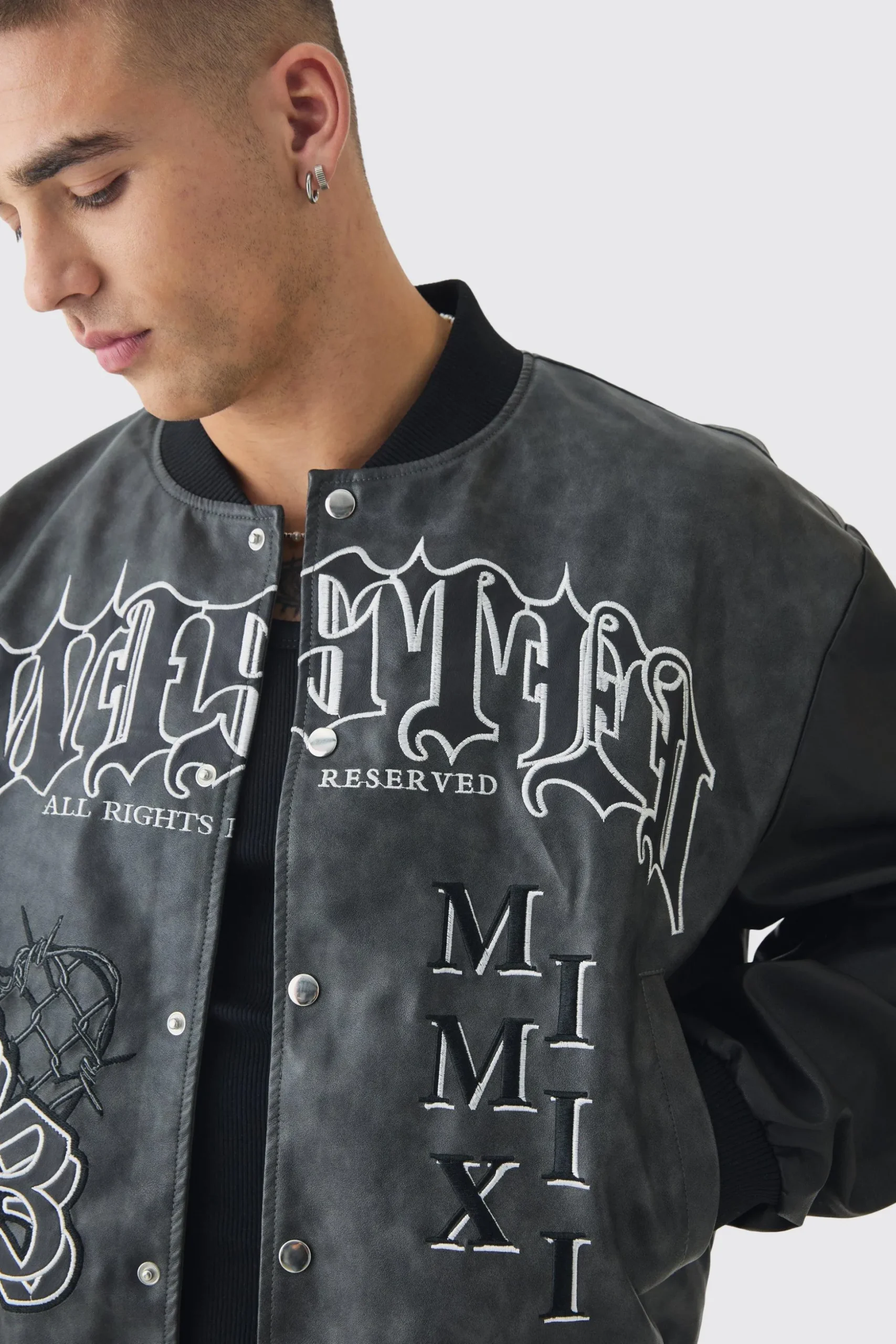 Boxy Tonal Badge Tumbled Pu Varsity Jacket In Black | BoohooMAN UK