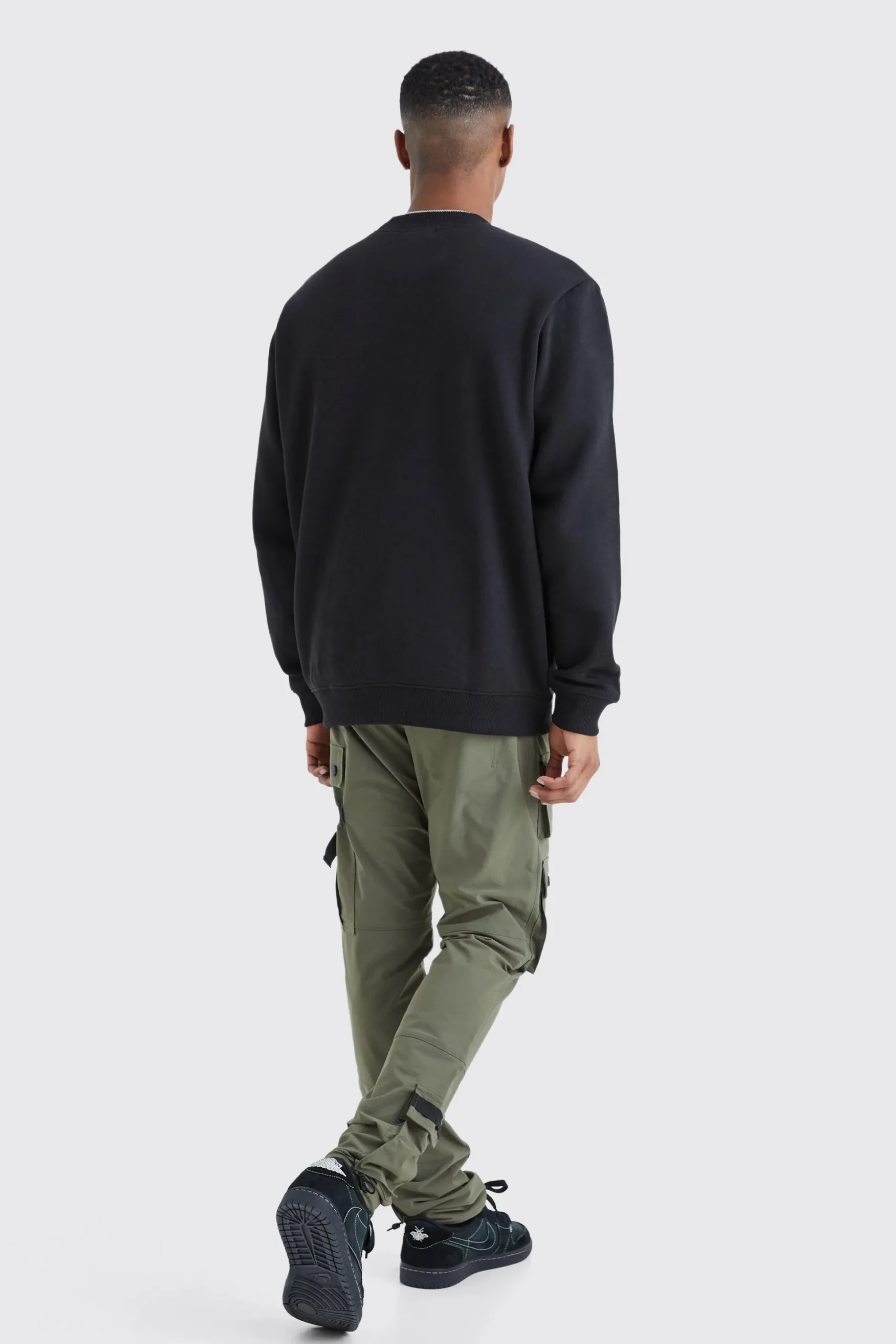 Elasticated Waist Slim Multi Cargo Strap Trouser | BoohooMAN UK