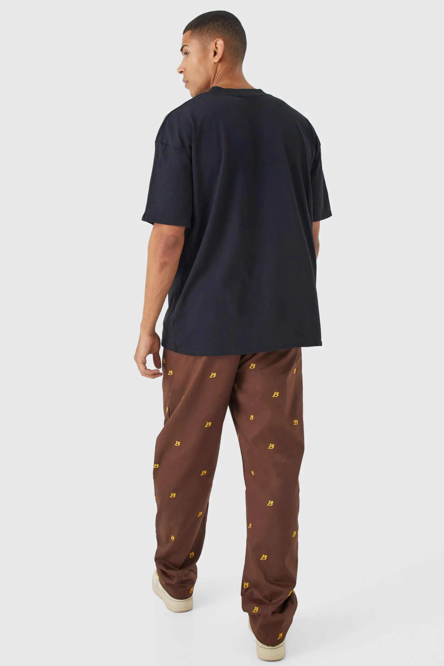 Fixed Waist Relaxed All Over Embroidery Trouser | BoohooMAN UK