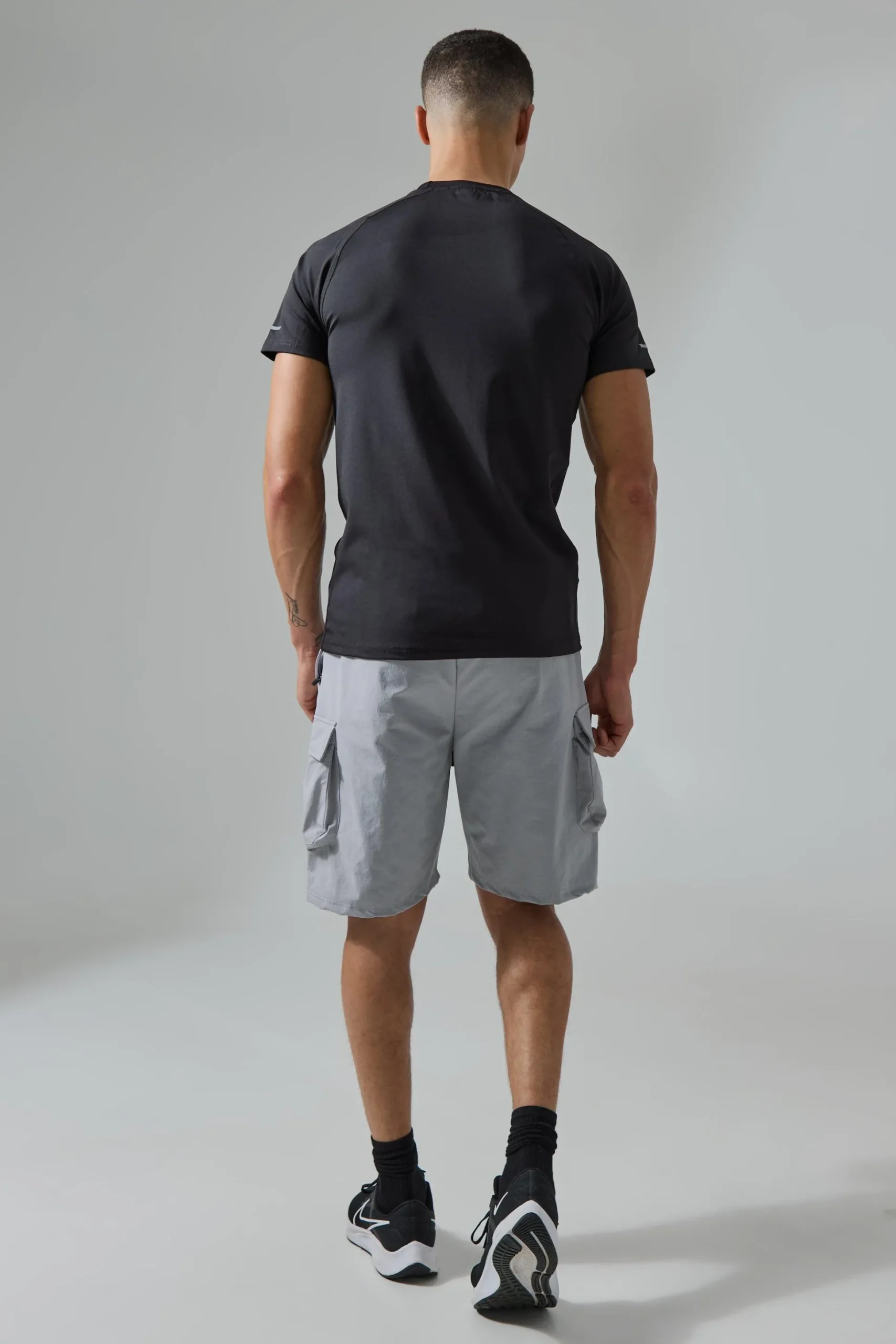 Man Active 5inch Oversized Reflective Cargo Short | BoohooMAN UK