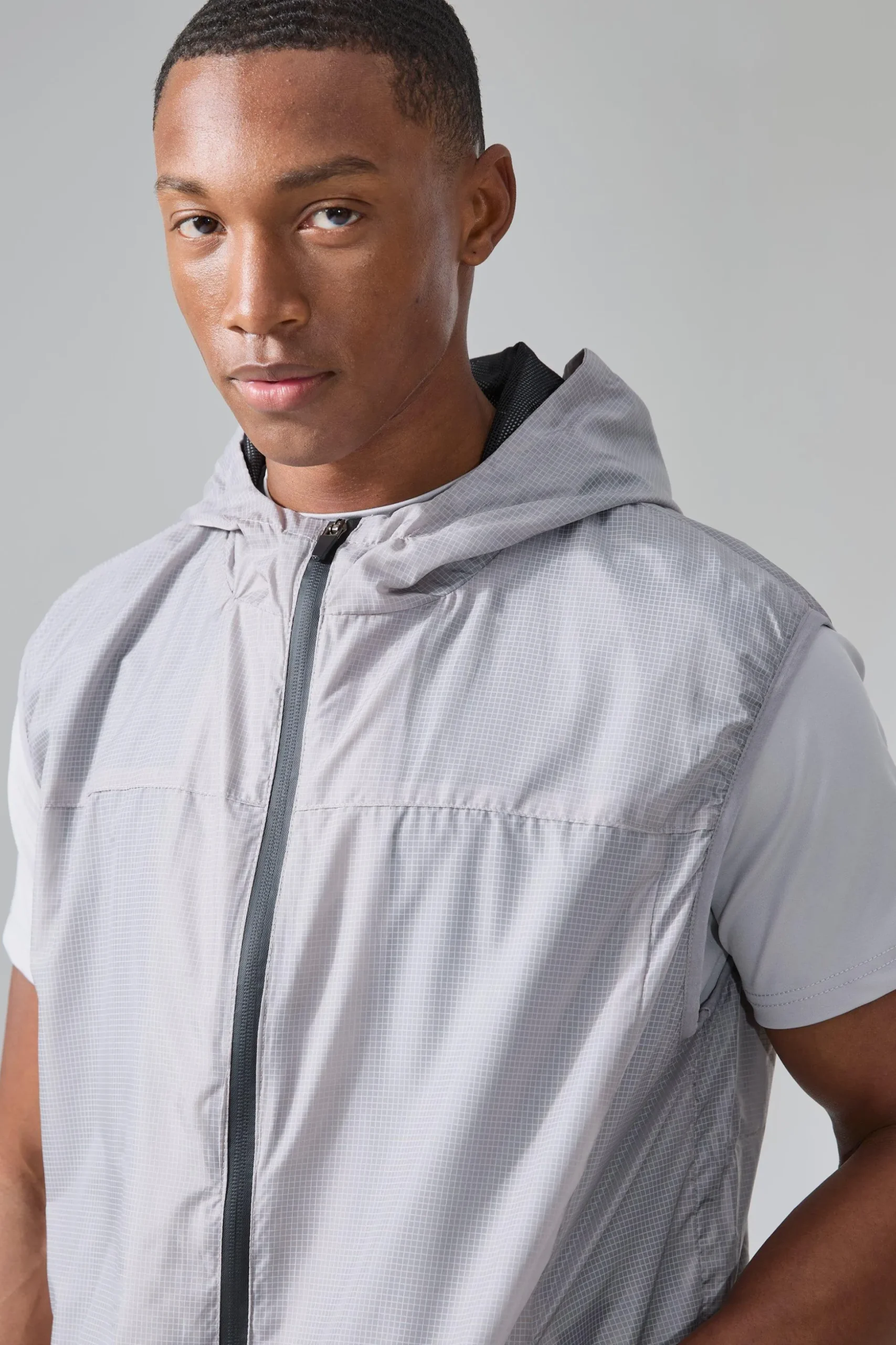 Man Active Mesh Lined Hooded Regular Fit Gilet | BoohooMAN UK