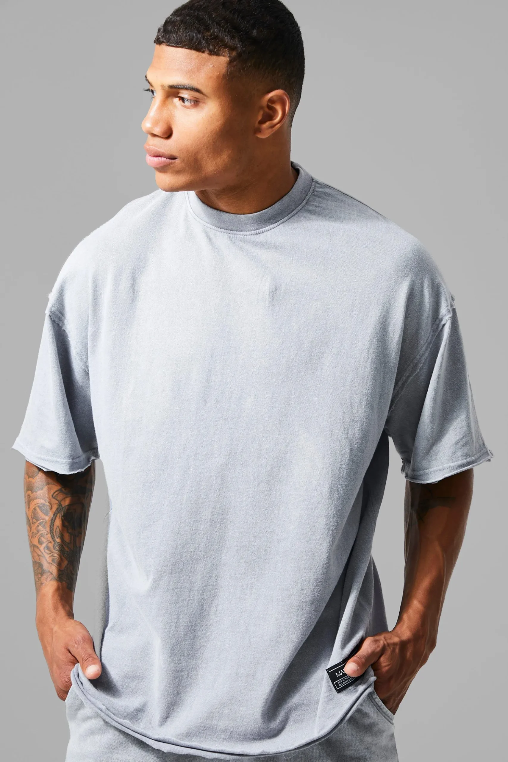 Man Active Oversized Acid Wash Raw T-shirt | BoohooMAN UK
