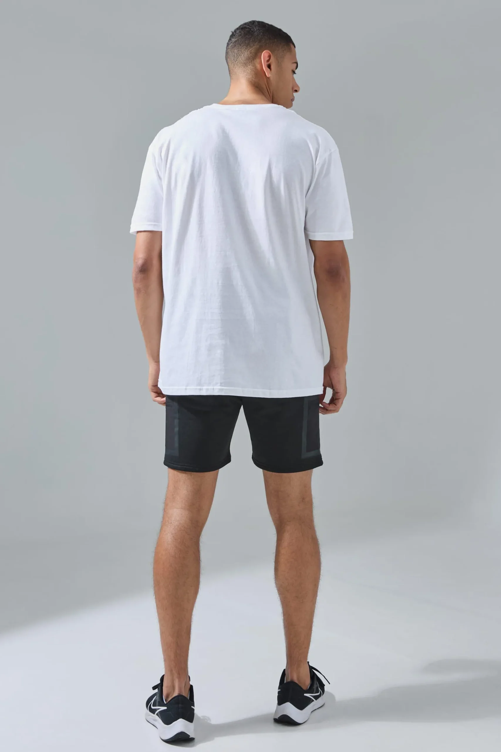 Man Active Oversized Athletic Track & Field Graphic T-shirt | BoohooMAN UK