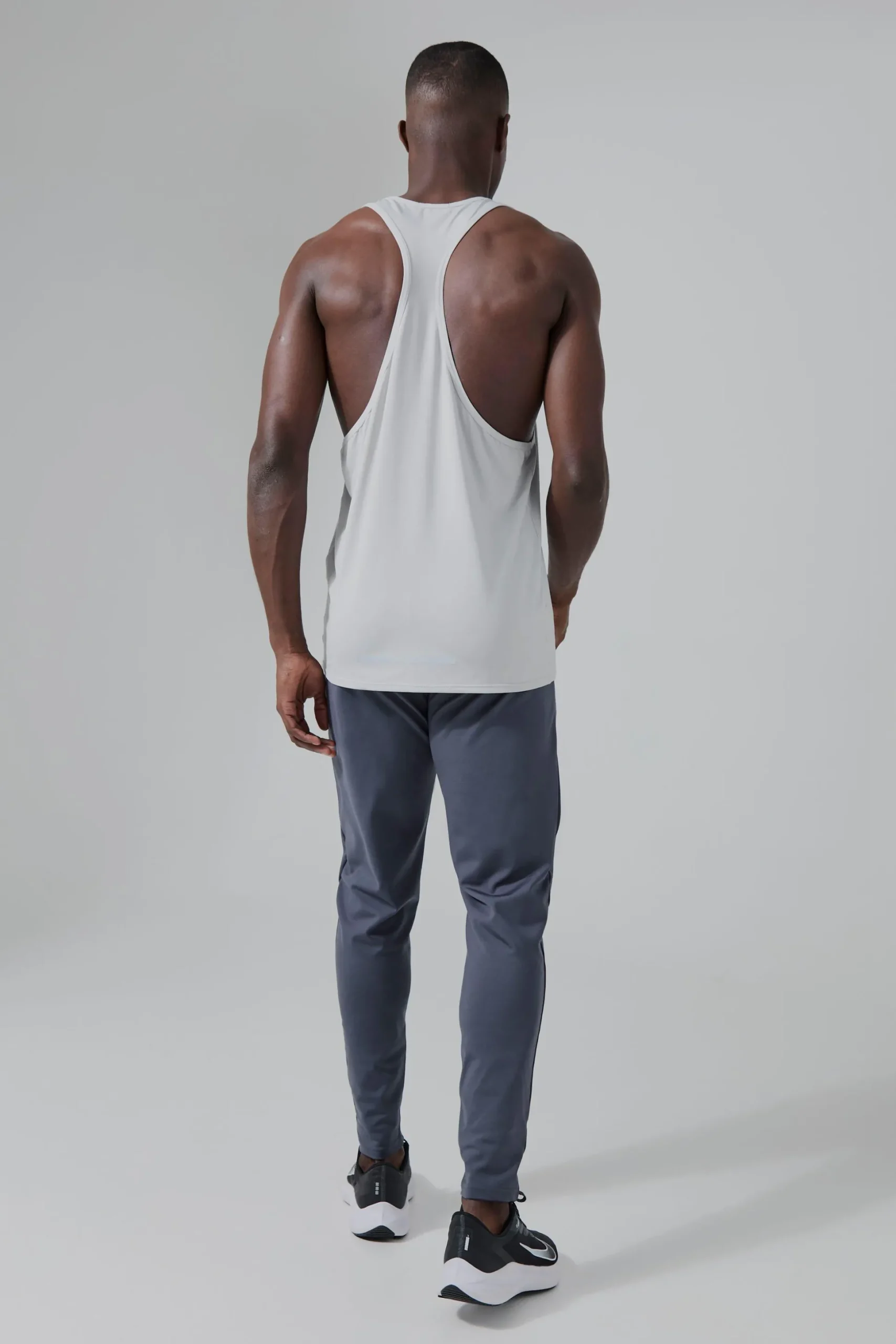 Man Active Poly Reg Fit Racer Vest | BoohooMAN UK