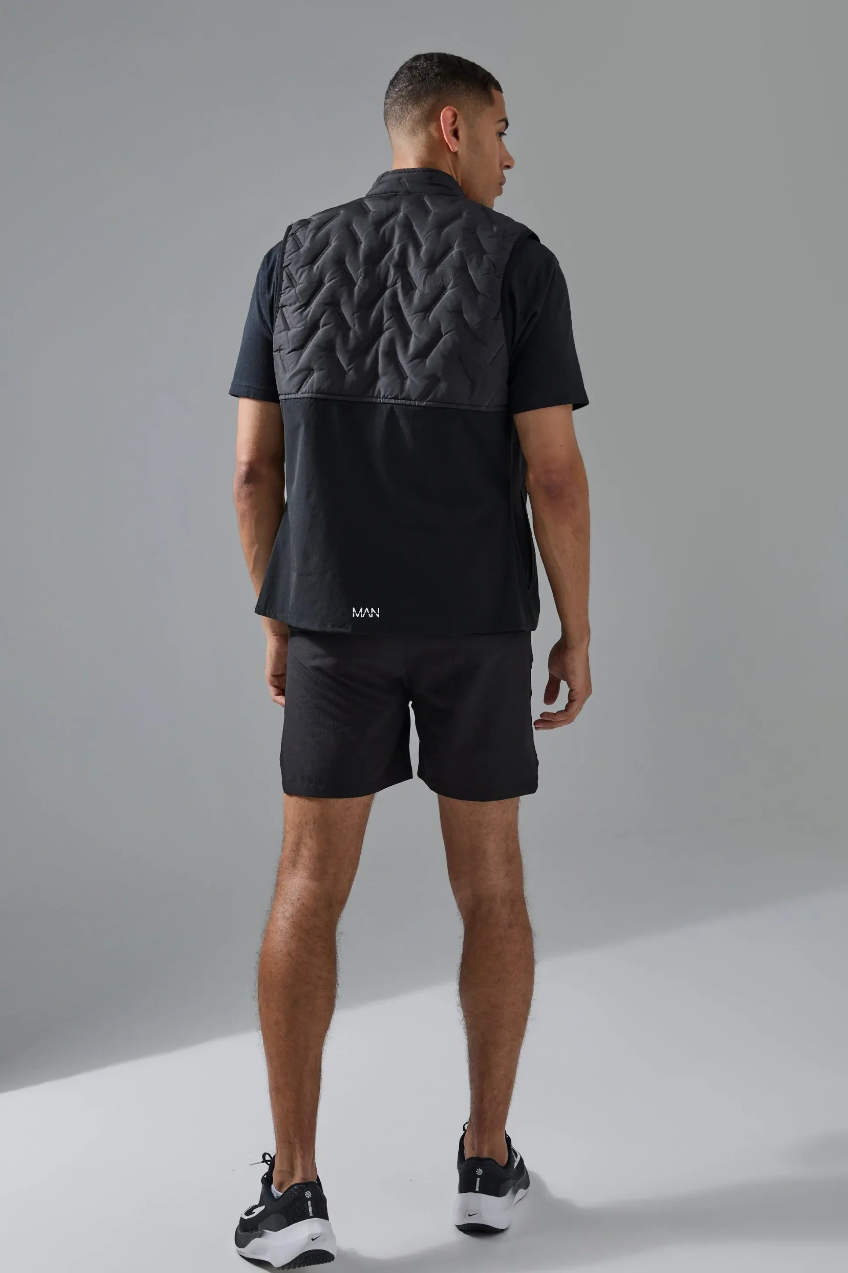 Man Active Quilted Funnel Neck Gilet | BoohooMAN UK