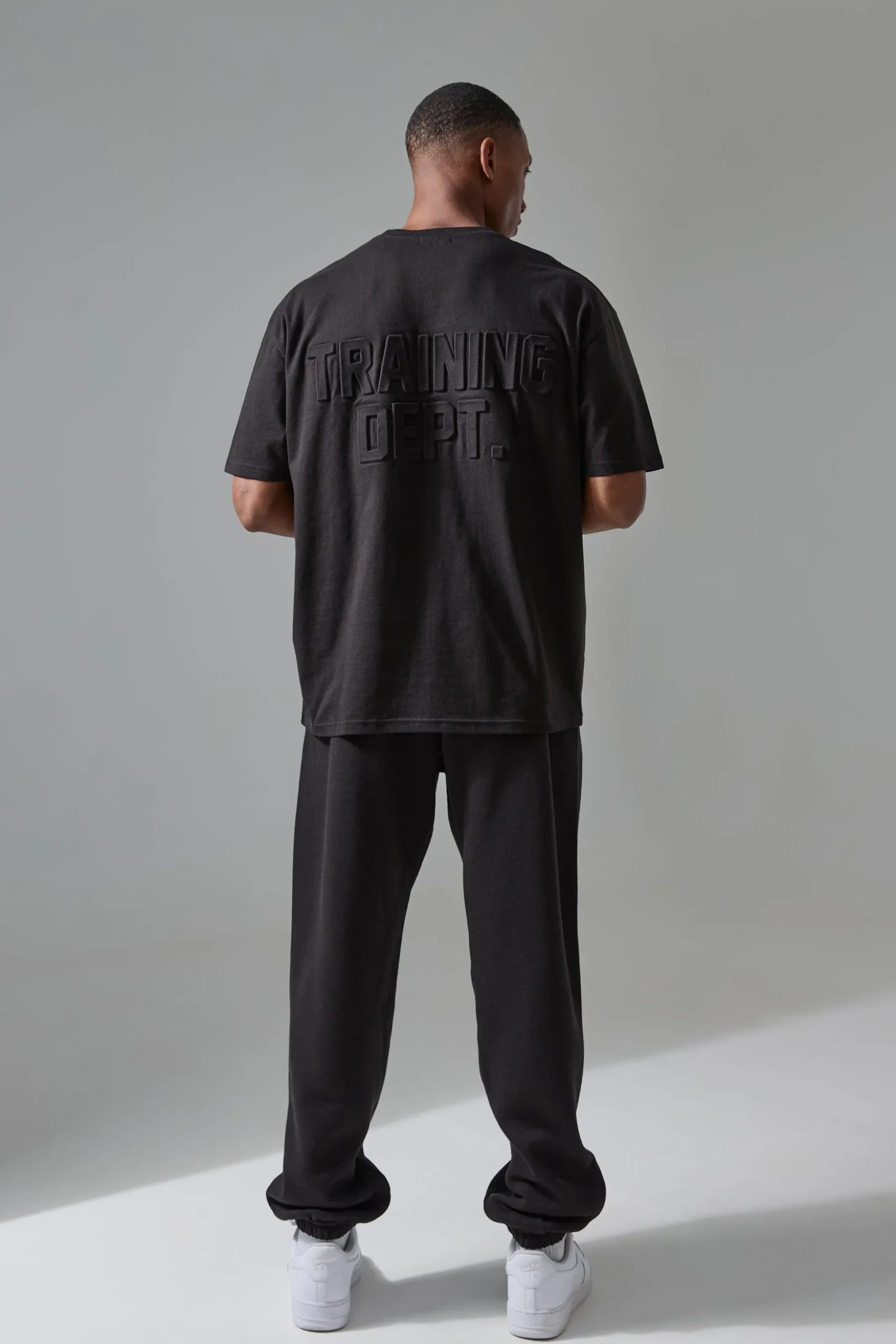 Man Active Training Dept Oversized Embossed T-shirt | BoohooMAN UK
