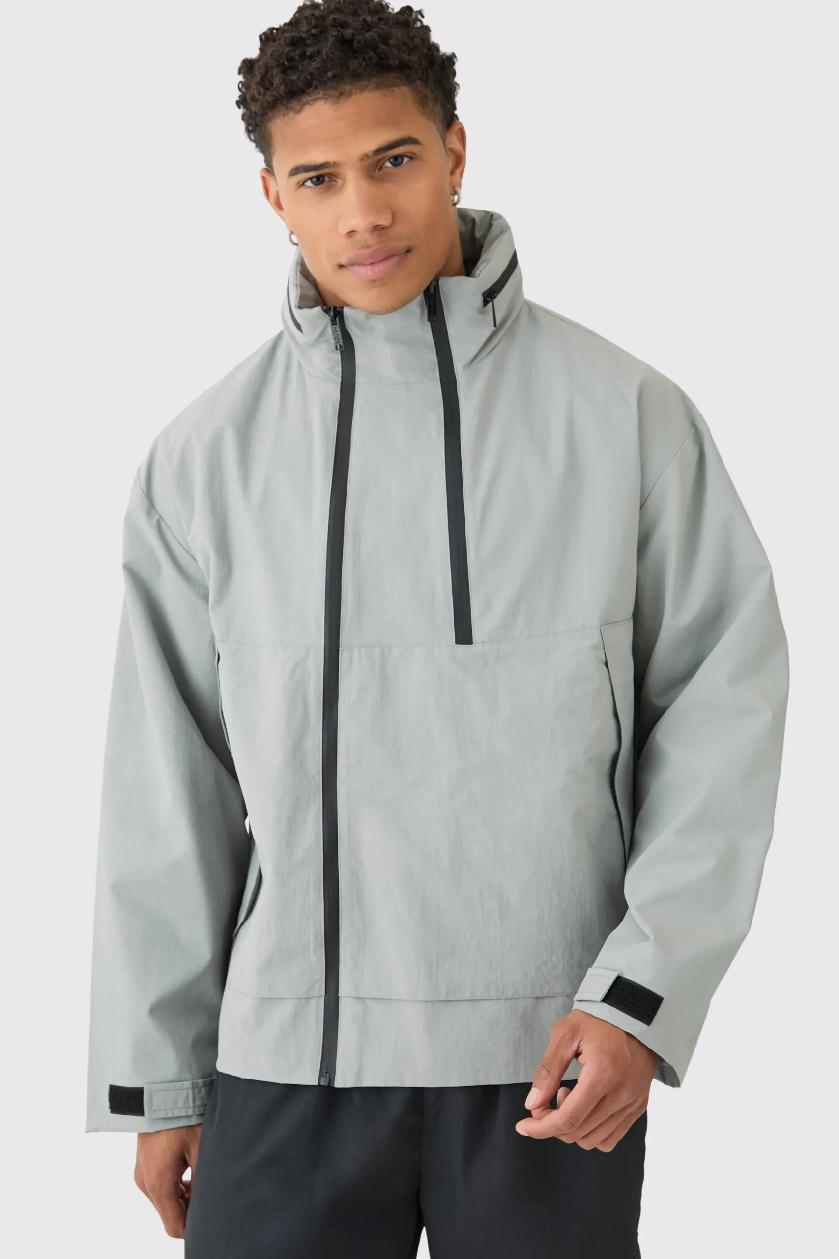 Man Tab Oversized Zip Detail Nylon Windbreaker In Grey | BoohooMAN UK