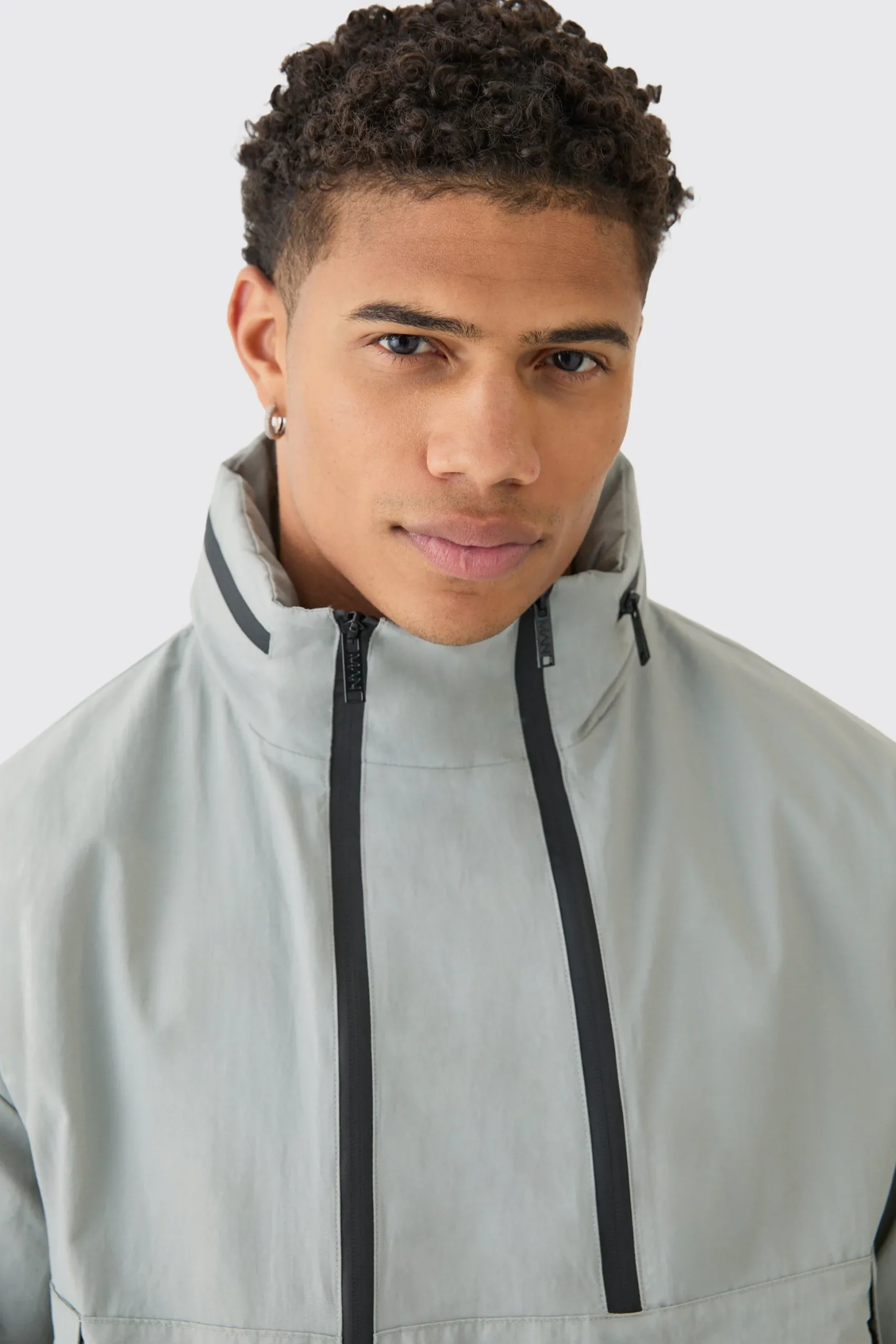 Man Tab Oversized Zip Detail Nylon Windbreaker In Grey | BoohooMAN UK