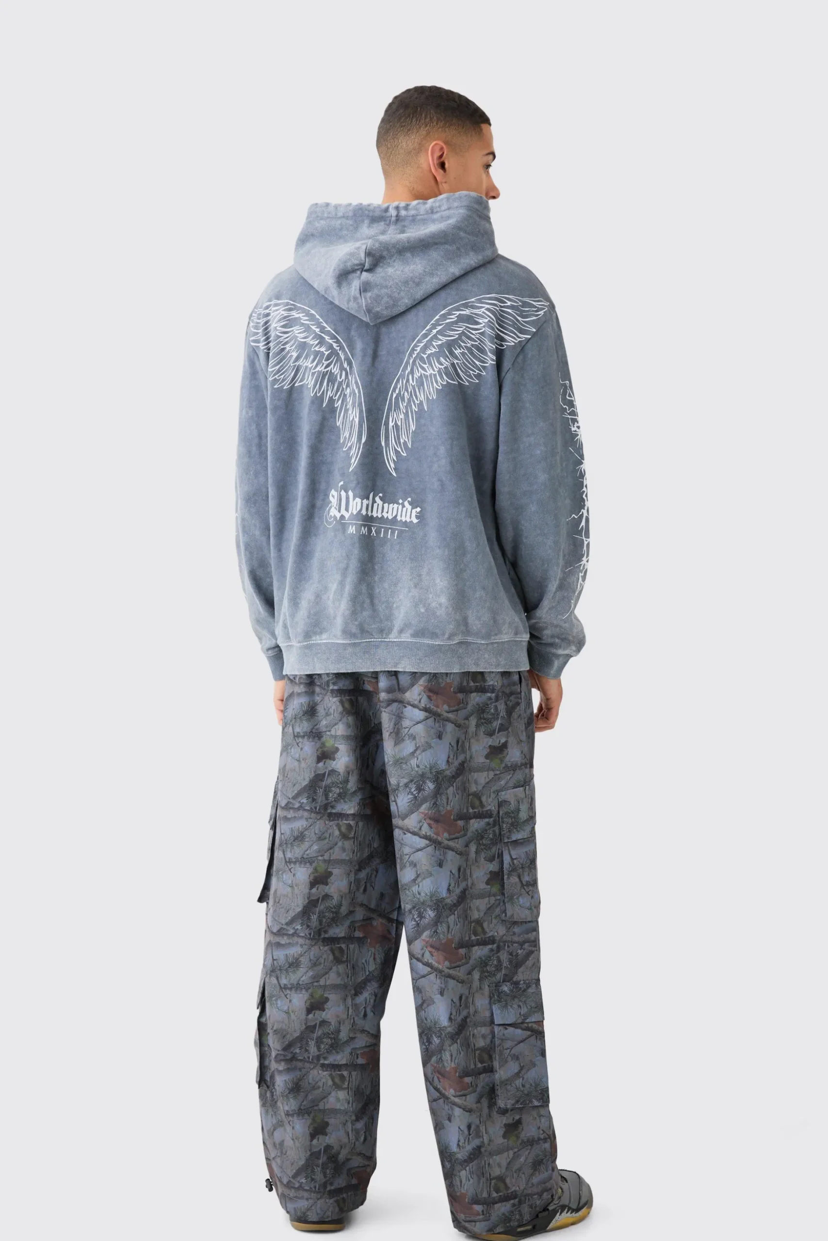 Oversized Acid Wash Embroidered Wing Graphic Hoodie | BoohooMAN UK