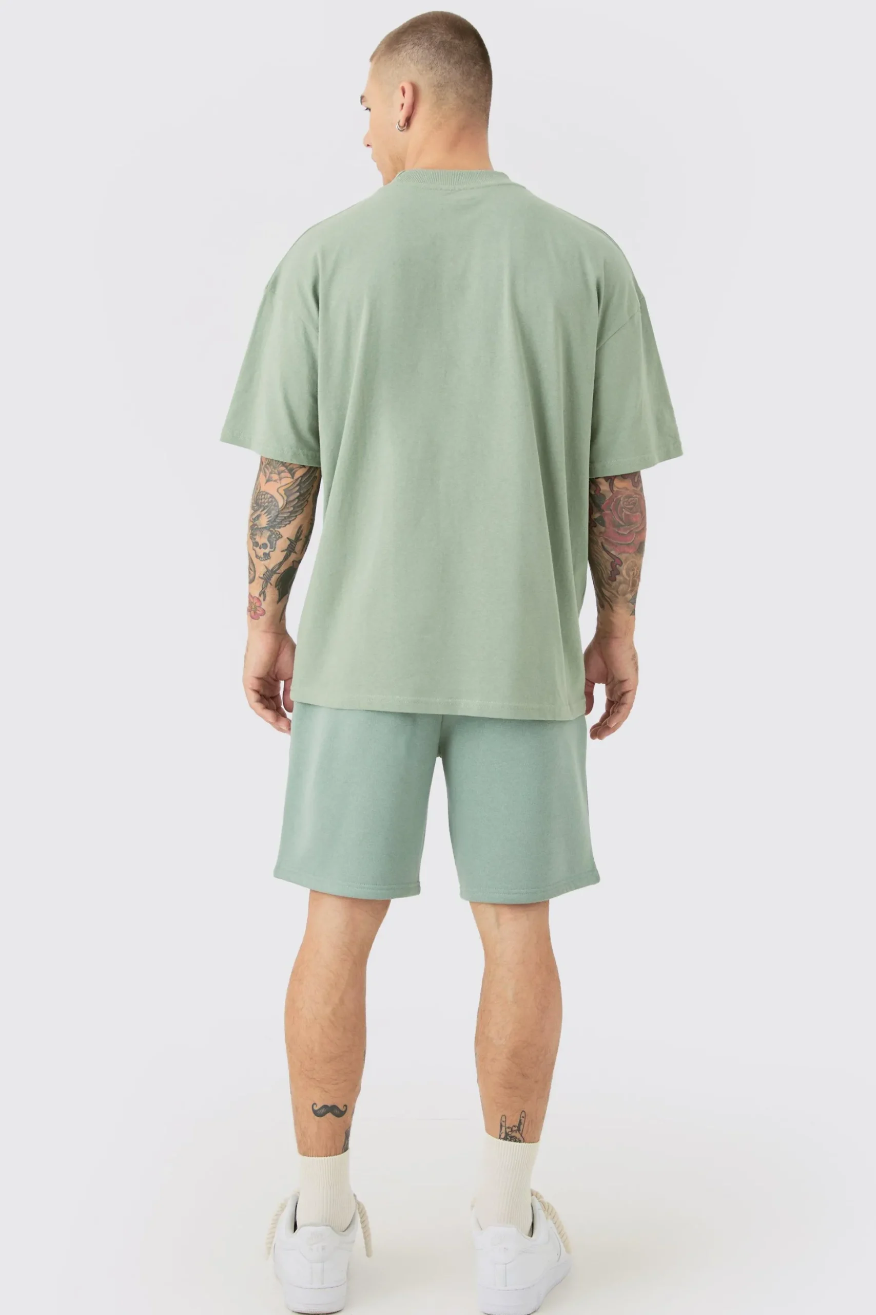 Oversized Extended Neck Limited Embossed T-shirt And Relaxed Short Set | BoohooMAN UK