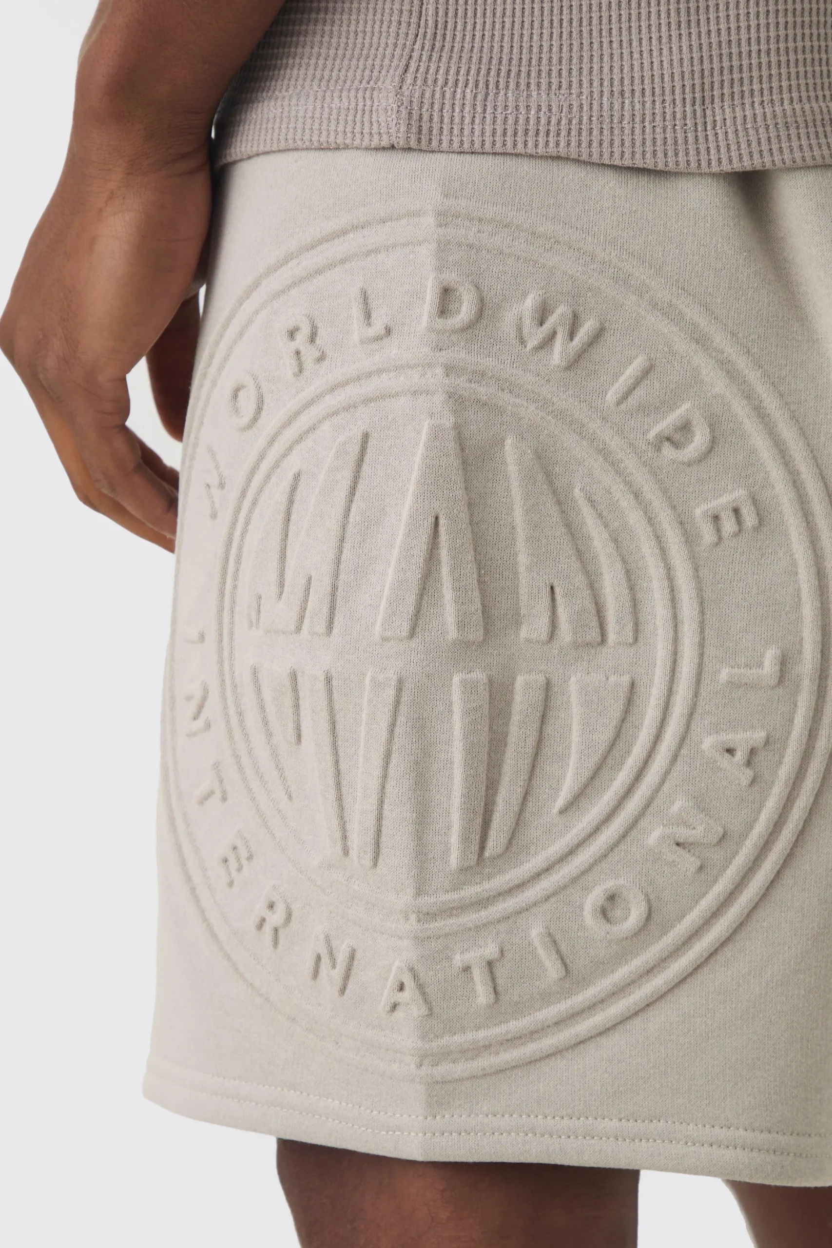 Oversized Long Length Worldwide Embossed Short | BoohooMAN UK