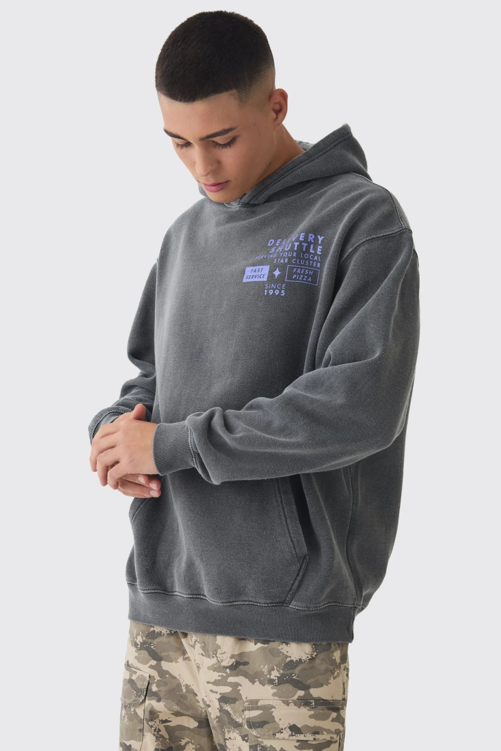 Oversized Wash Pixar Toy Story Pizza Planet License Hoodie | BoohooMAN UK