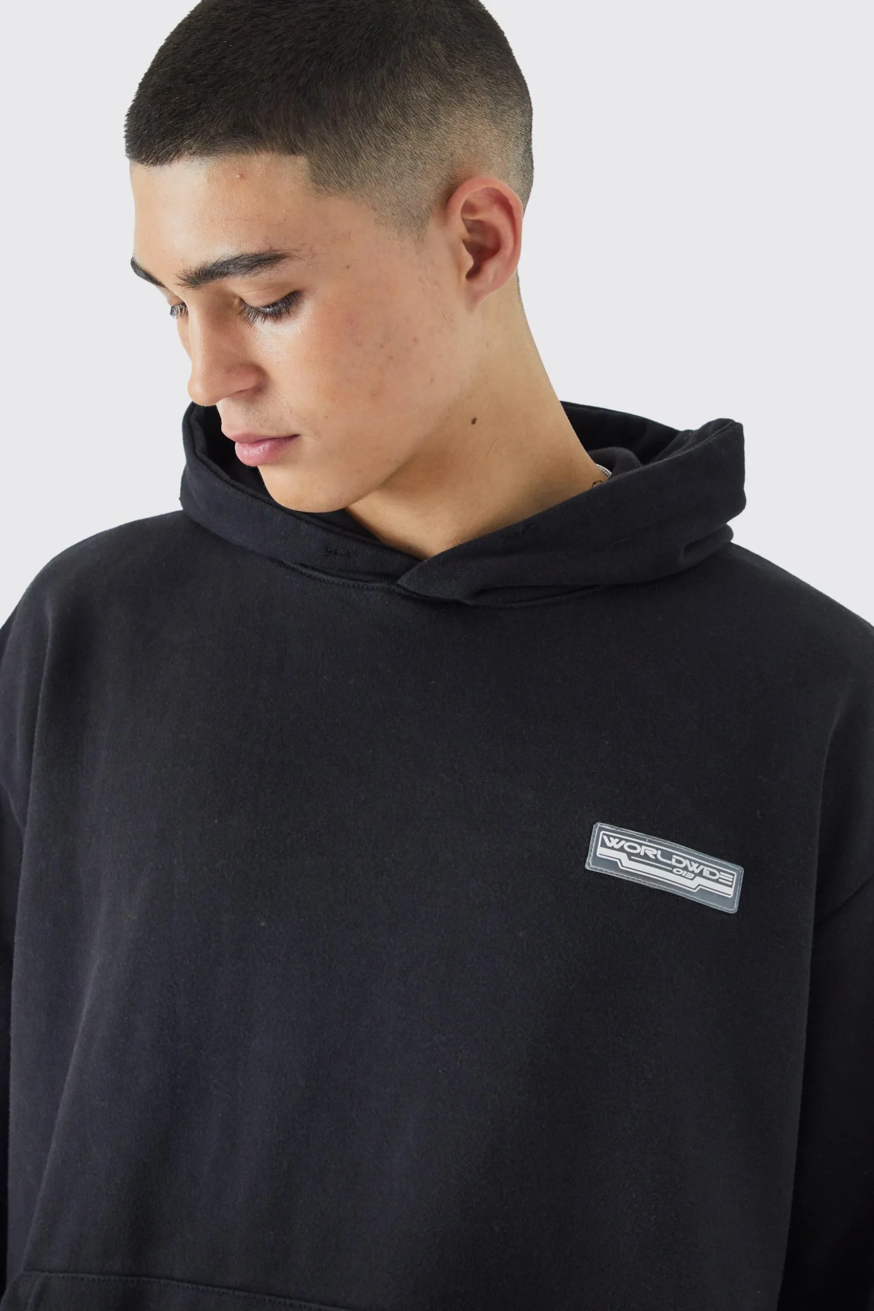 Oversized Washed Loopback Rubber Badge Hoodie | BoohooMAN UK
