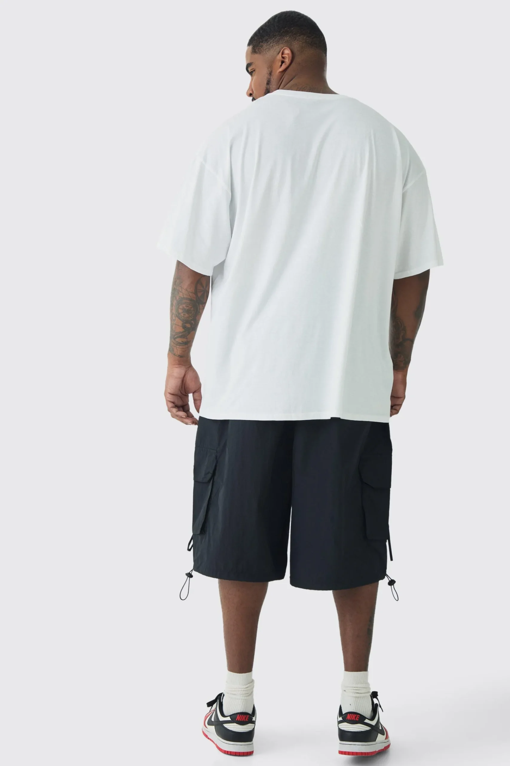 Plus Crinkle Nylon Man Cargo Parachute Shorts In Black | BoohooMAN UK