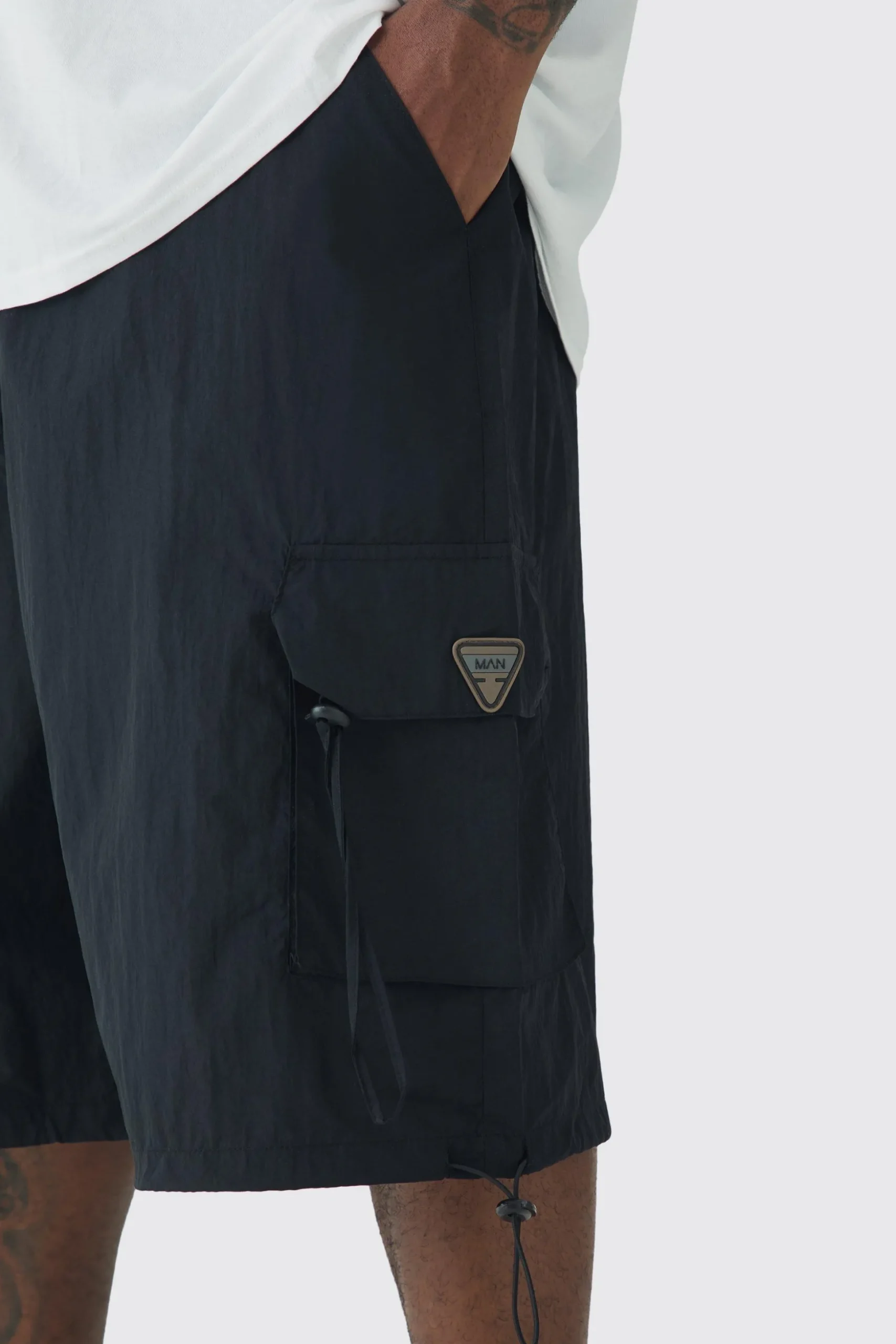 Plus Crinkle Nylon Man Cargo Parachute Shorts In Black | BoohooMAN UK