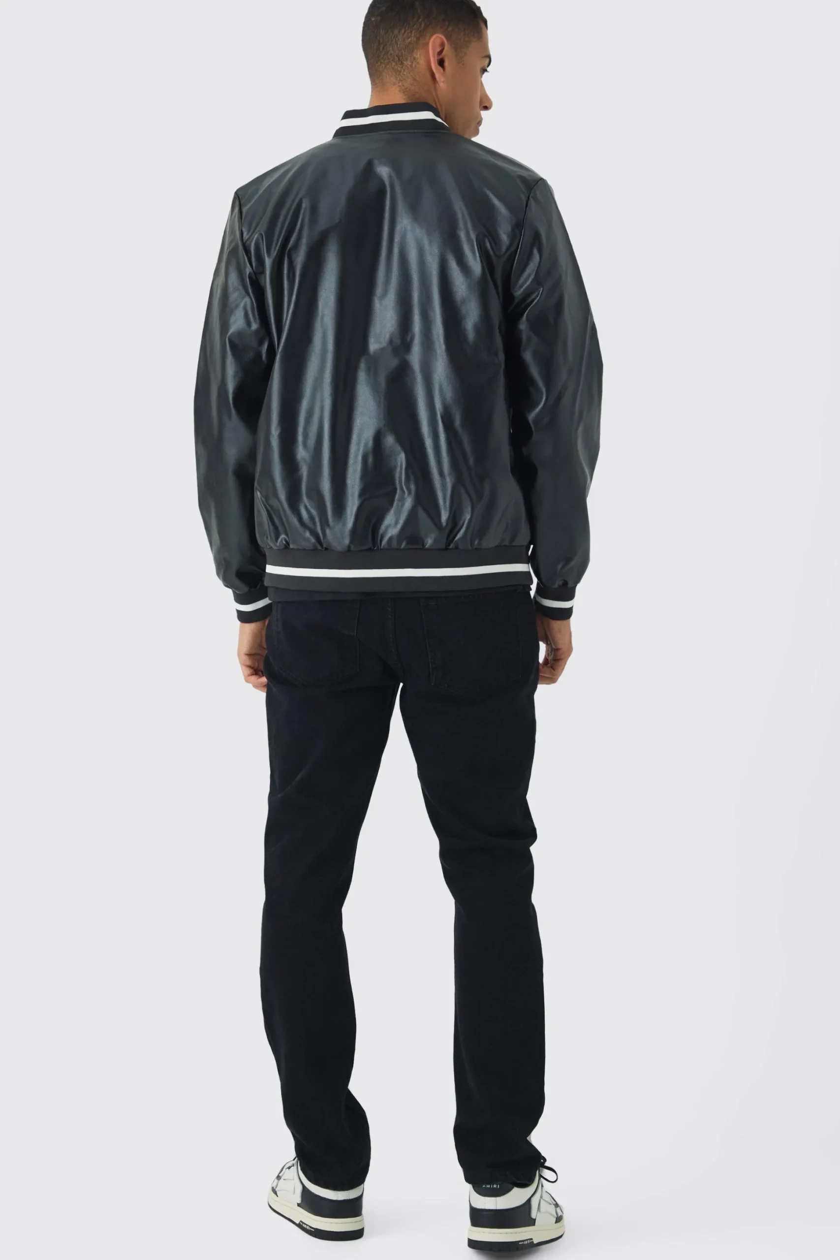 PU Badge Varsity Jacket In Black | BoohooMAN UK