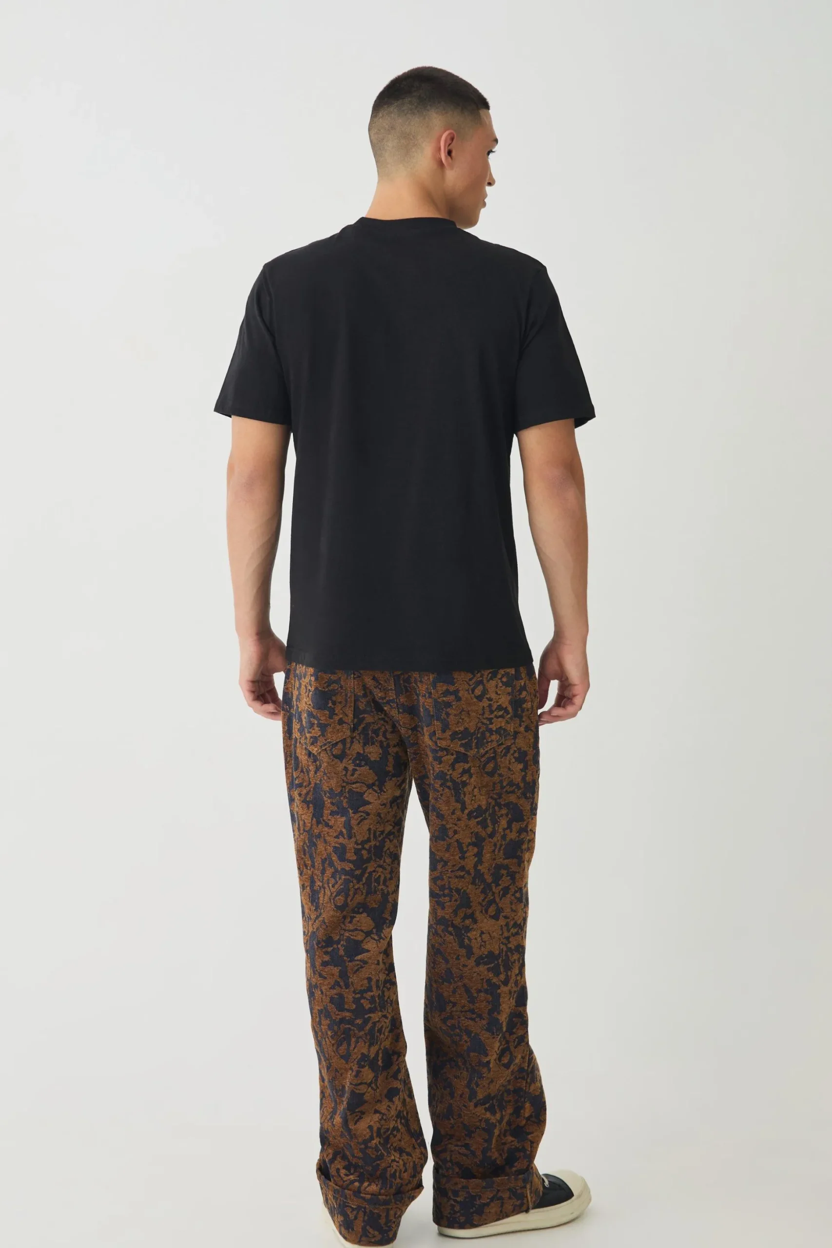 Relaxed Fit Abstract Flock Turn Up Hem Jeans | BoohooMAN UK
