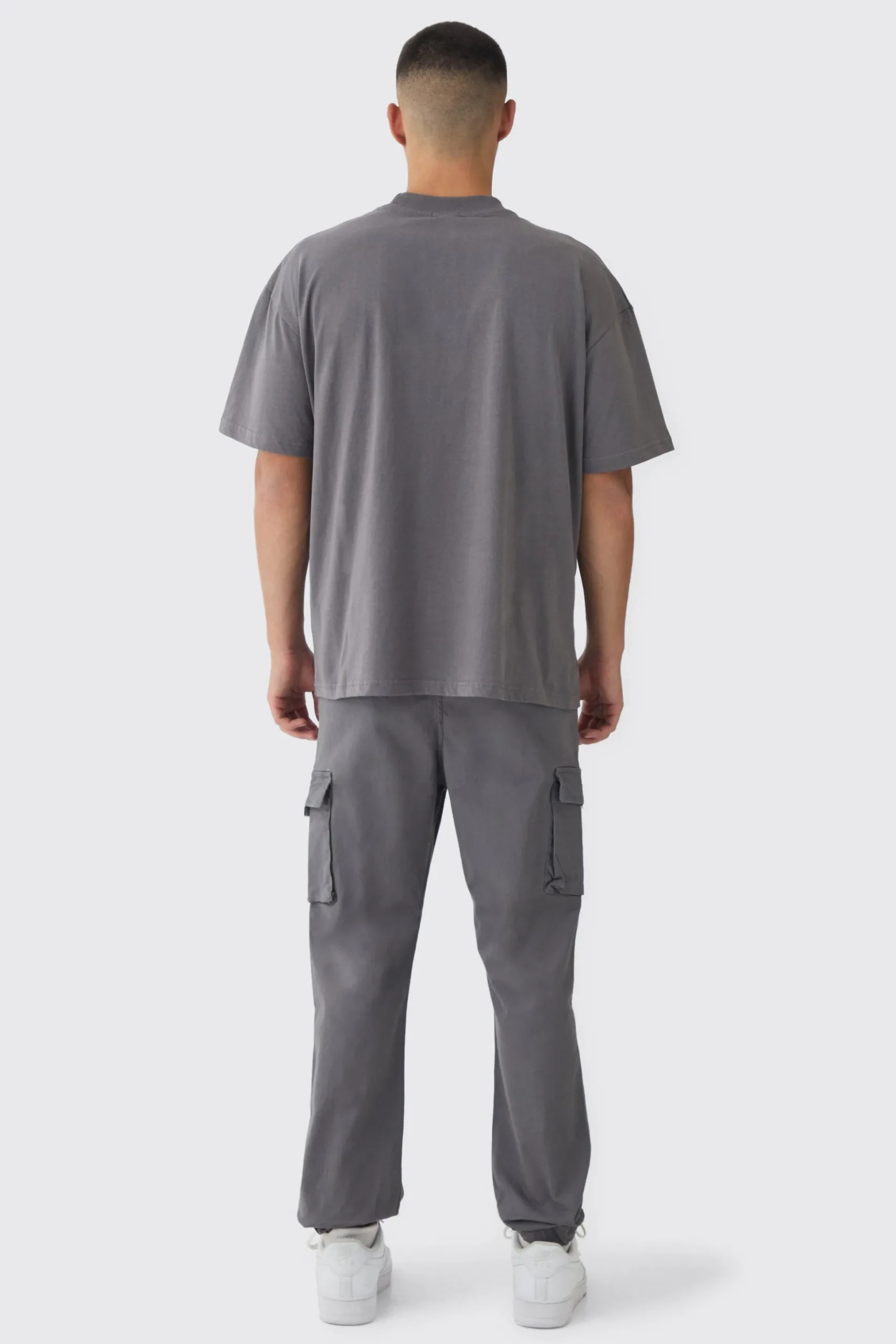Slim Fit Elasticated Waist Woven Tab Cuffed Cargo Trousers | BoohooMAN UK