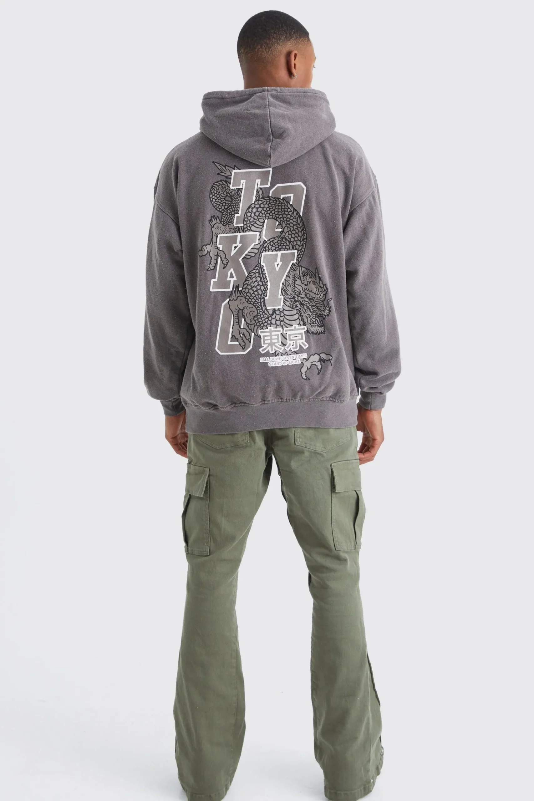 Slim Stacked Flare Camo Gusset Rip And Repair Trouser | BoohooMAN UK