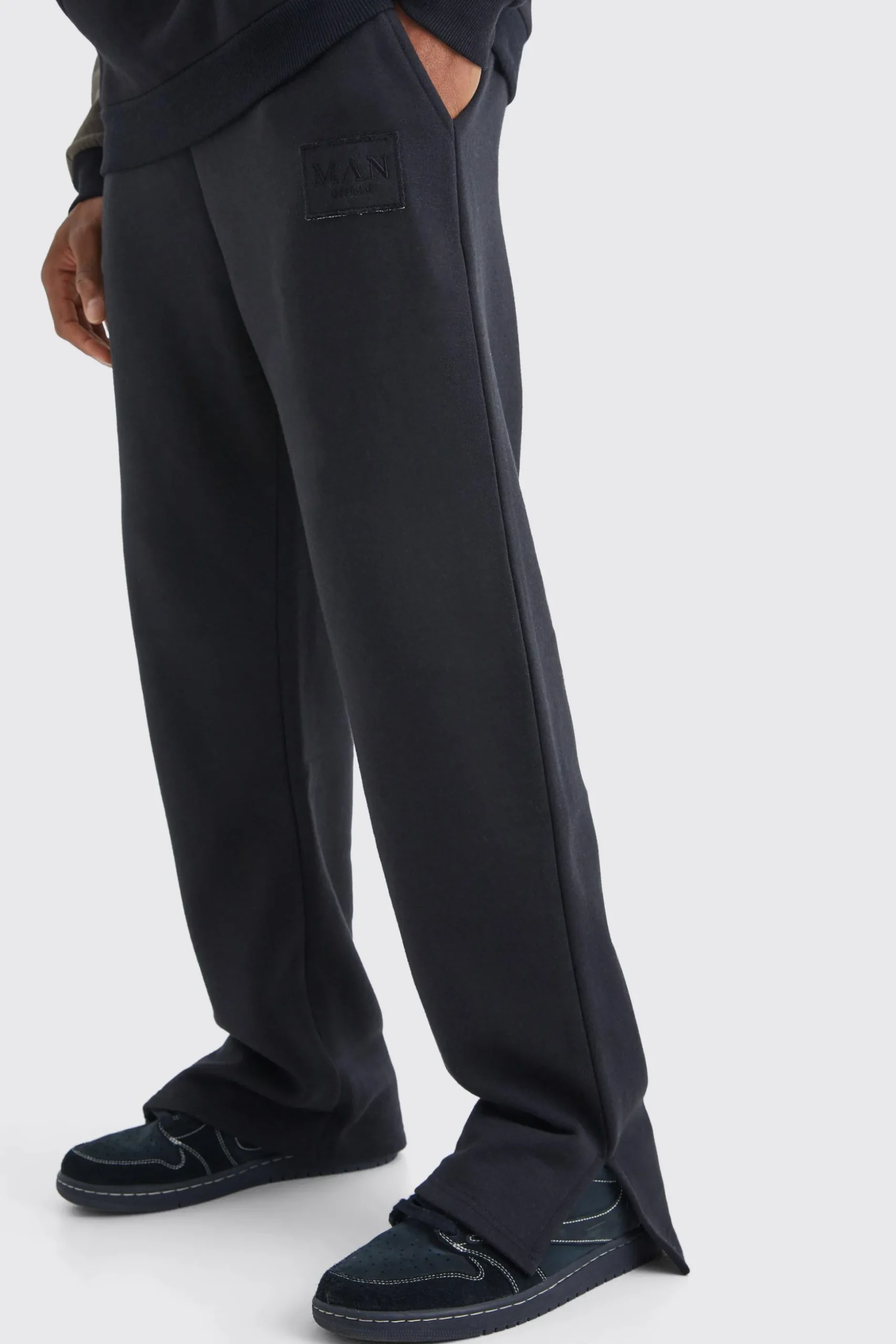 Split Hem Jogger With Distressed Badge | BoohooMAN UK